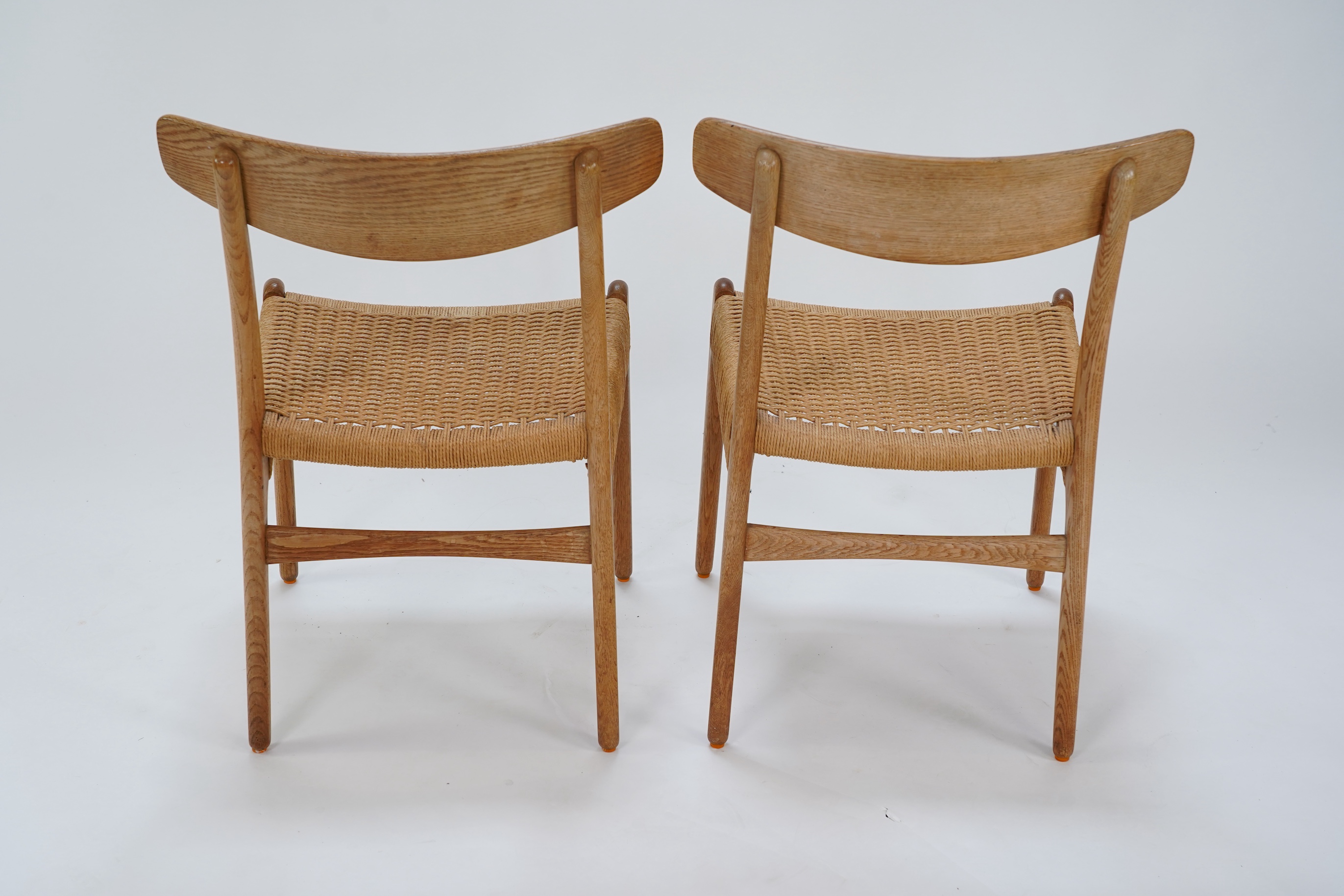 Hans Jørgensen Wegner (Danish, 1914-2007) for Carl Hansen & Søn Møbelfabrik : Two oak 'CH23' dining chairs